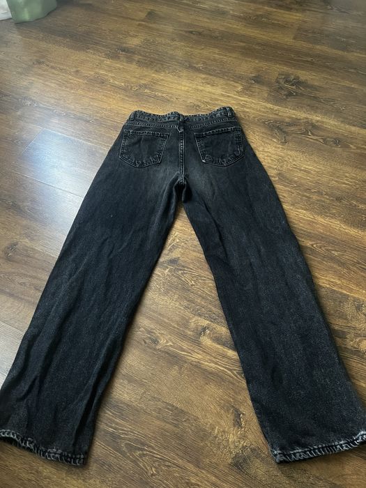 Женские черные джинсы клеш