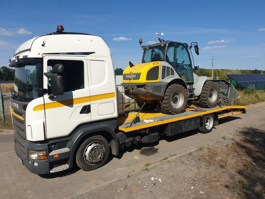 Transport ciagnikow maszyn rolniczych auto laweta Autolaweta