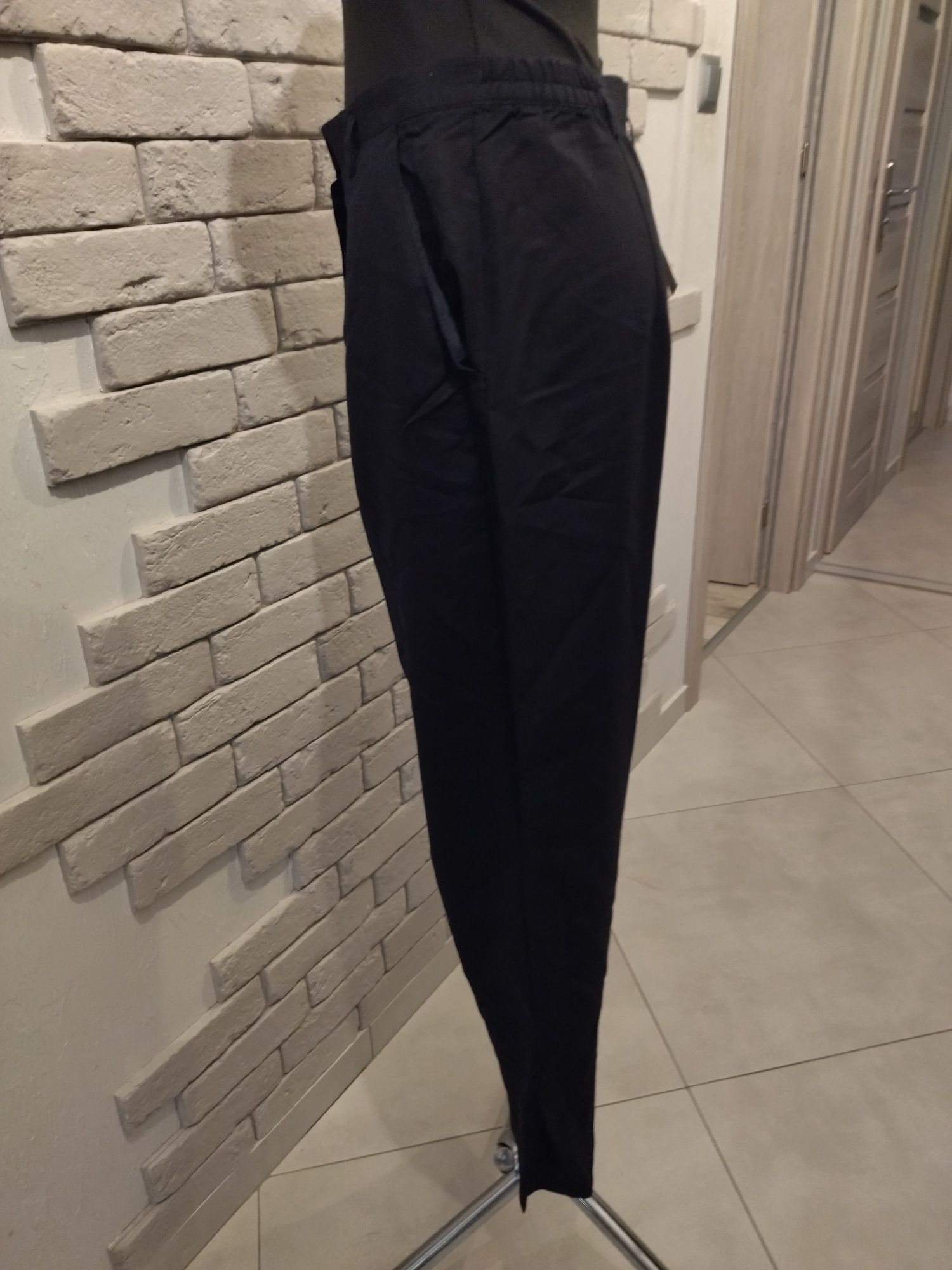 Nowe eleganckie spodnie długość 3/4 - letnie