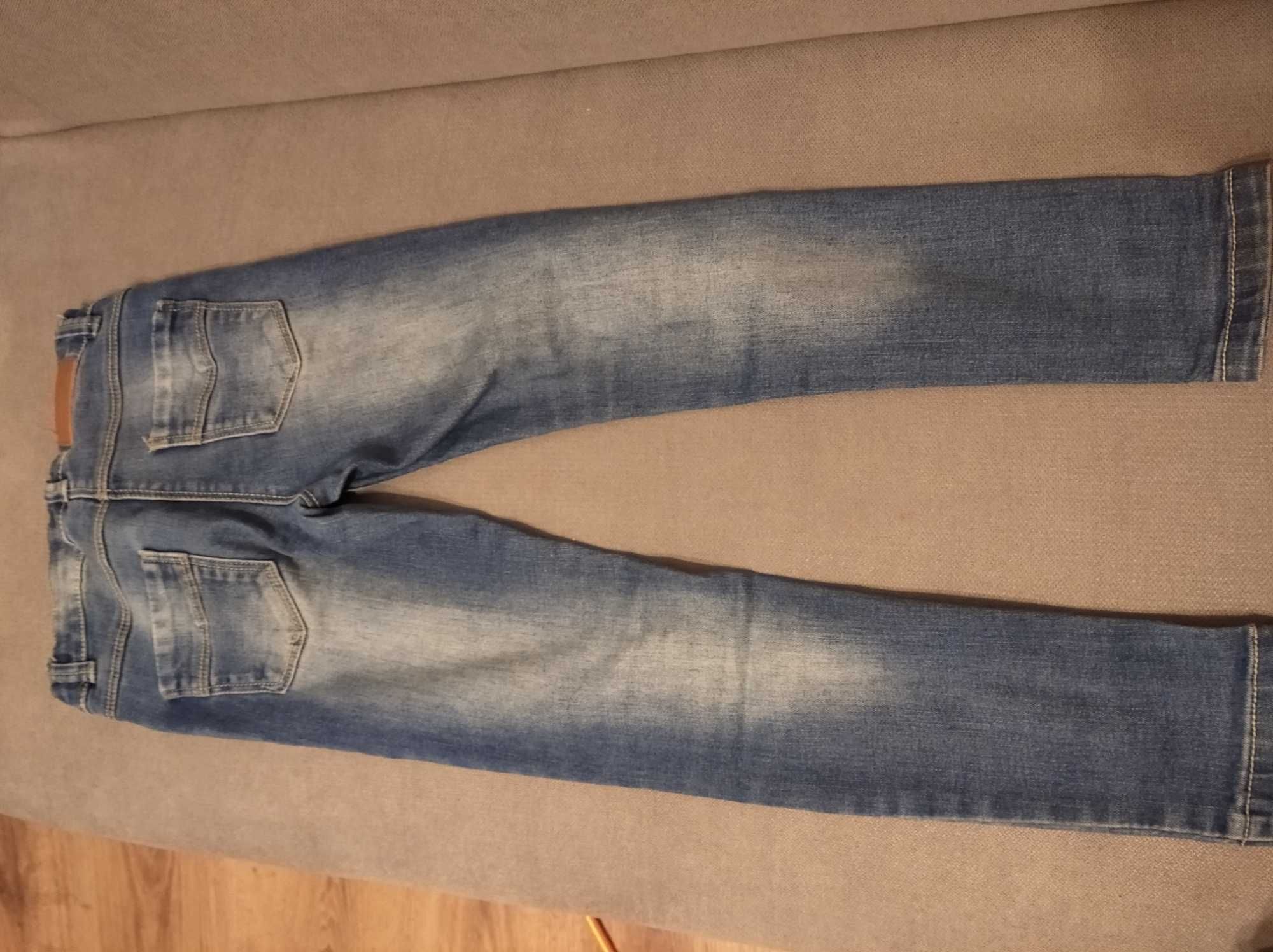 Spodnie jeans r 122