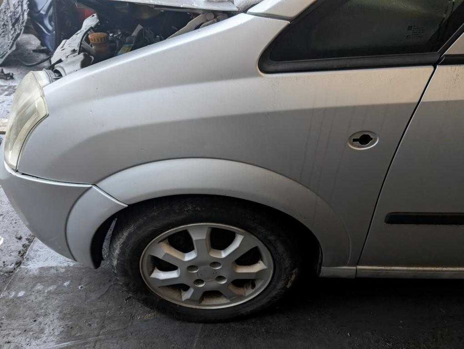 Błotnik przód przedni lewy Opel Meriva A Z157