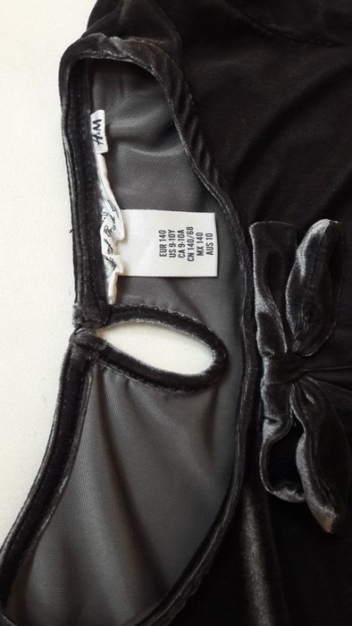 Elegancka bluzka dziewczęca H&M rozm. 134 - 140