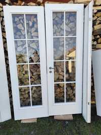 Drzwi wewnętrzne białe podwójne dwuskrzydłowe z ościeżnicami kompletne