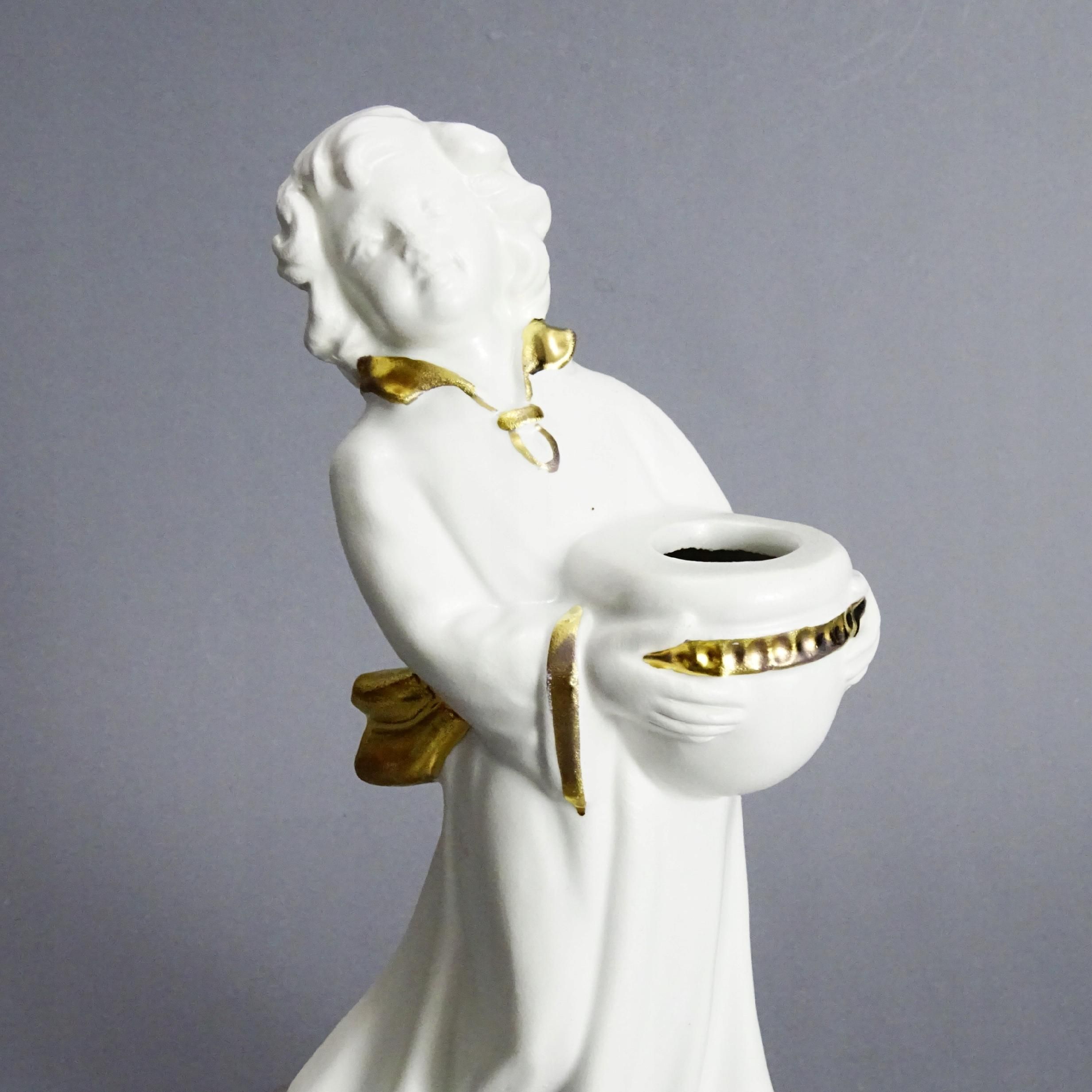 świecznik figurka ceramiczna