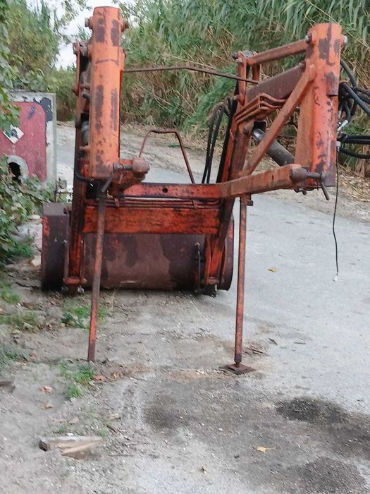 Carregador frontal tenias