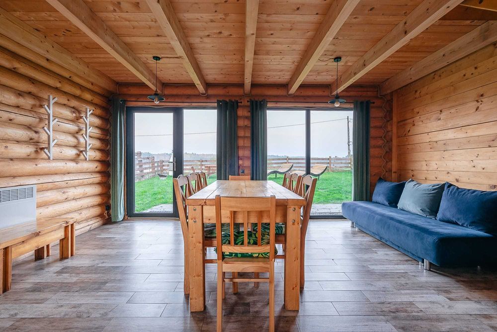 Domek na urodziny nad jeziorem sauna jacuzzi Warmia Mazury plaża