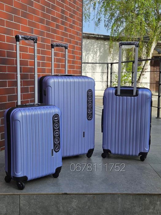 Розмірі L ВЕЛИКА з розширенням WINGS 2011 Польща валізи чемоданы