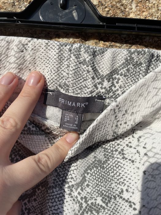Calças estilo culotte em padrão cobra