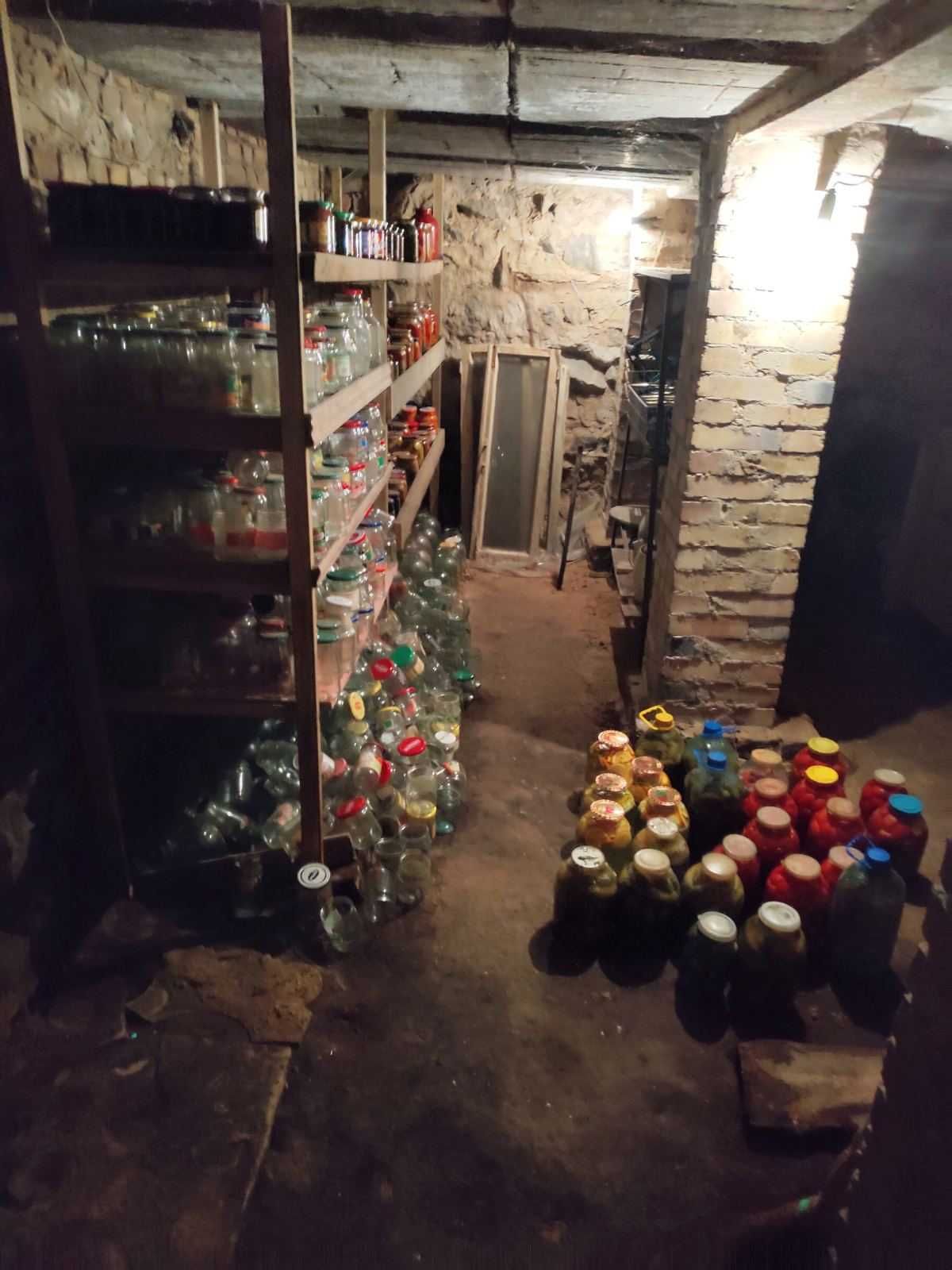 Продажа 1/2 ч. дома и земли  по ул.Нежинская ул. 29 (ст.м.Шулявка)