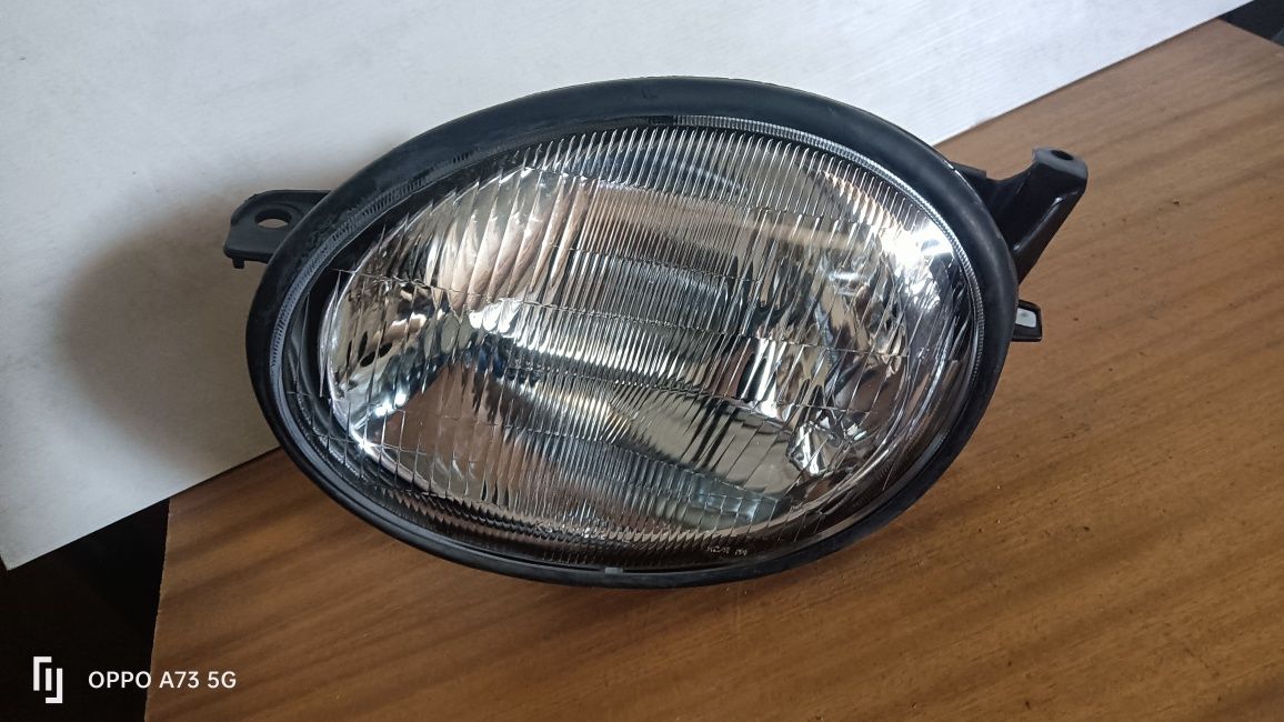 Farol Toyota Corolla ótica 1998 esquerda