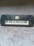 Teclado Casio Song Bank SA-65 e suporte