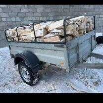 Прицеп рубленых дров твёрдых пород.