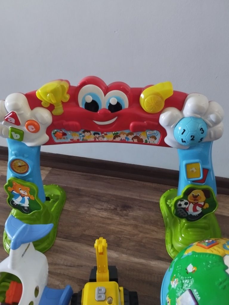 Zestaw zabawek Fisher price, samolot, bramka, globus,