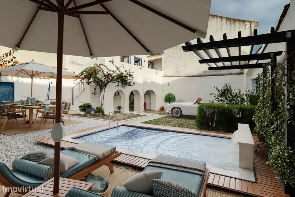 Moradia T5 com 420m2, terreno 461m2, poço, forno, espaços multifuncion