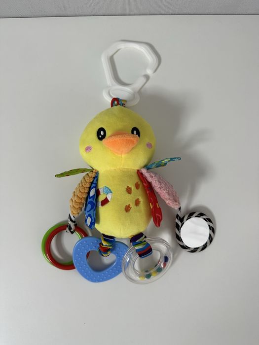 Іграшки-підвіски на коляску