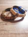 Pulseiras em pedra branca e castanha da marca Seanna