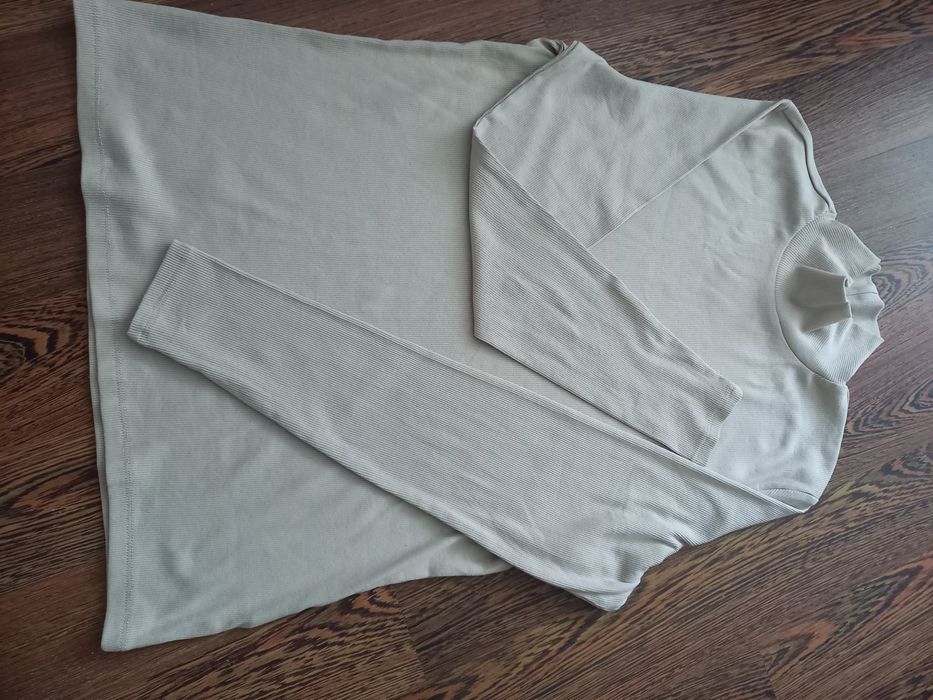 Продам  гольф  бежевого  кольору