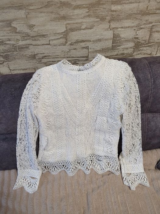 Біла ажурна блузка-кофта