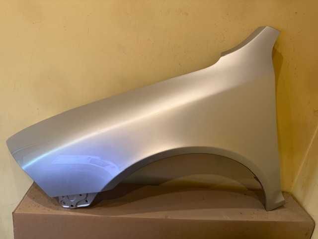 Octavia II 04-08 BŁOTNIK lewy 9102