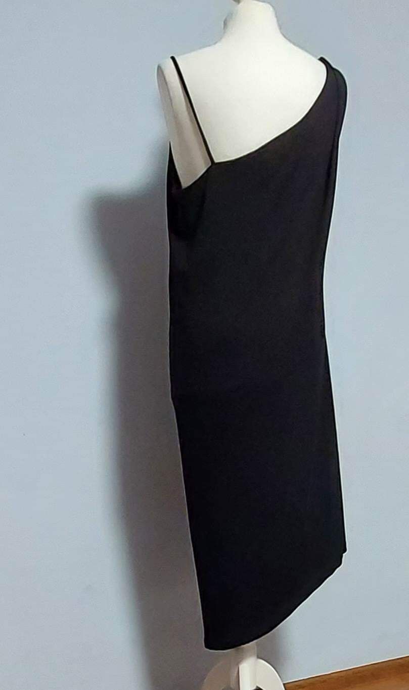 Czarna elegancka sukienka firmy H&M. Rozmiar 40. Nowa z metką