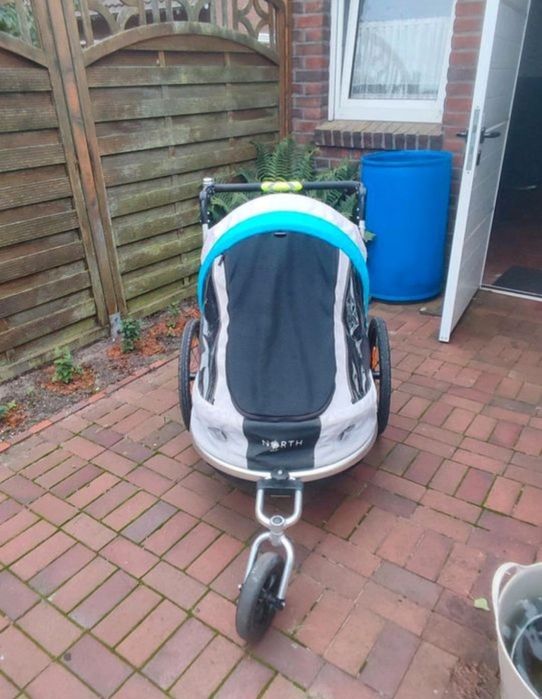 Przyczepka rowerowa dla dziecka North 13,5 Rapider