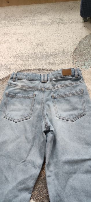 Jeansy niebieskie 134