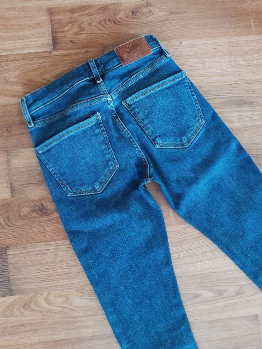 Jeansy skinny z wysokim stanem rozmiar 32 (6) firmy River Island