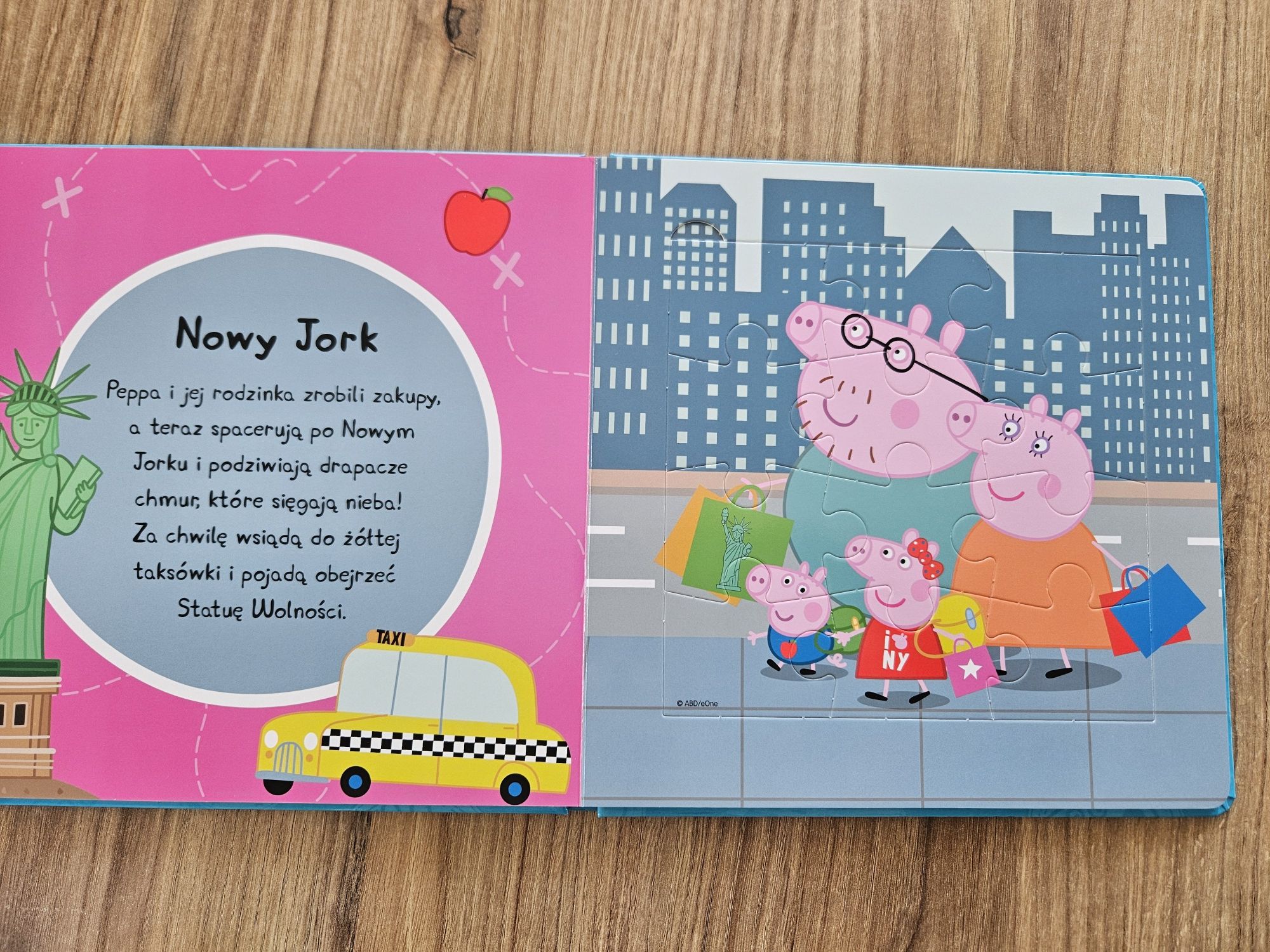 Ksiazka puzzlami peppa pig świat do odkrycia