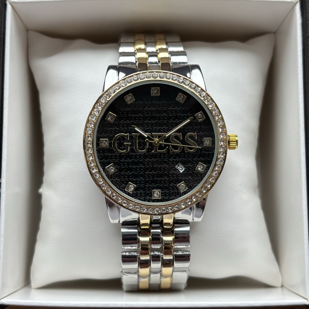 Жіночий годинник Guess на браслеті комбінованого кольору з датою