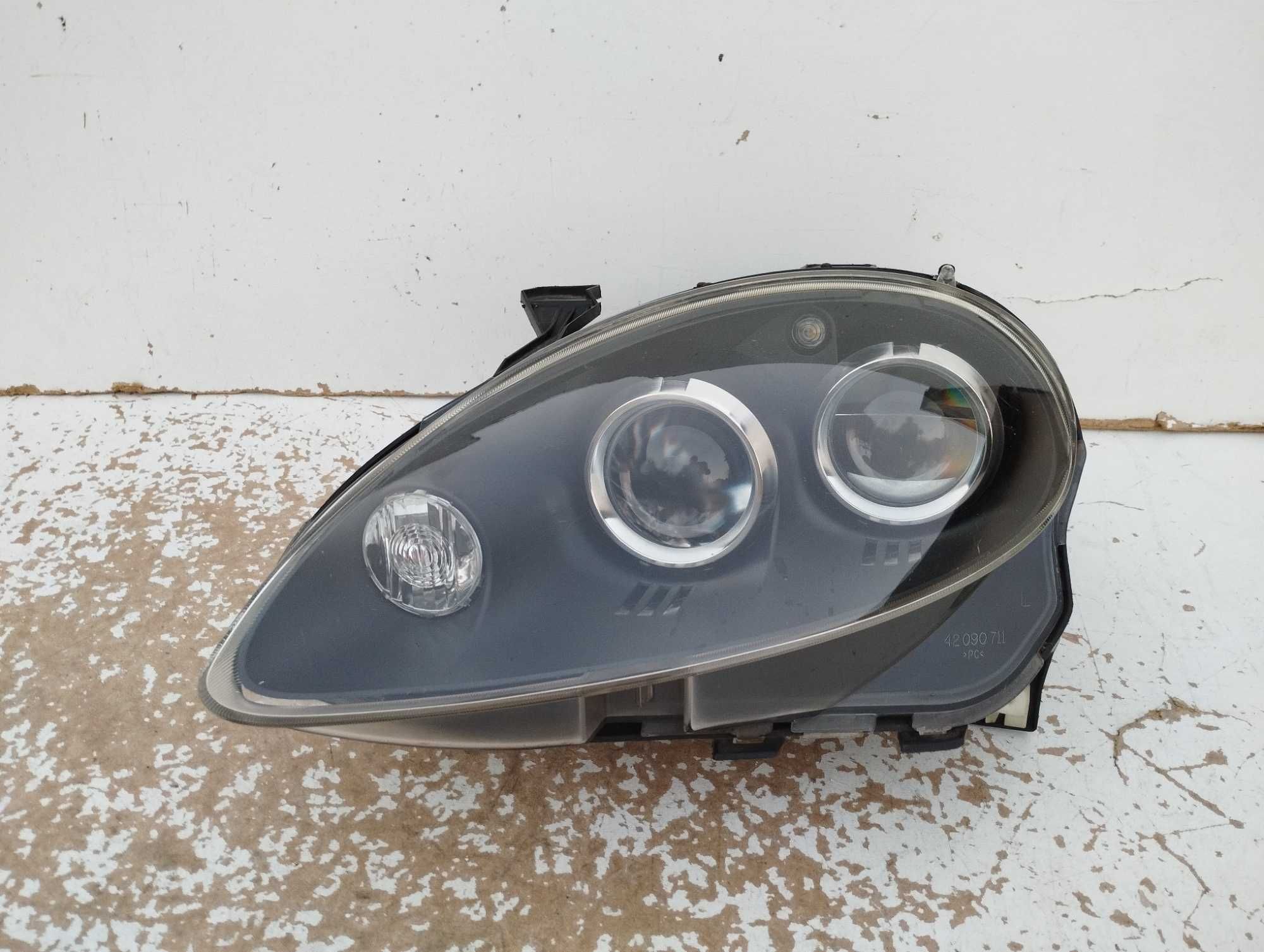 Mg TF lampa przednia lewa ANGLIK