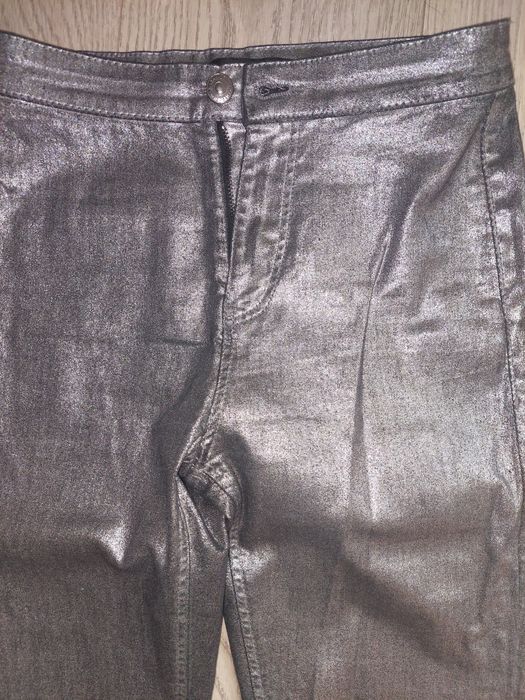 Srebrne jeansy damskie r.36 sinsay