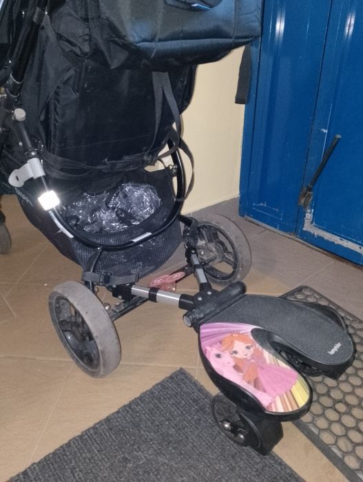 Dostawką do wózka BumpRider