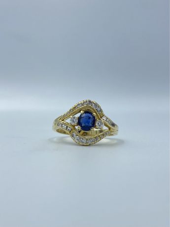 Złoty damski pierścionek z szafirem i diamentami 0,87ct 750