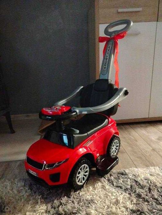 Duży Jeździk Autko Zabawka Interaktywna dla
Dzieci Oparcie Schowek