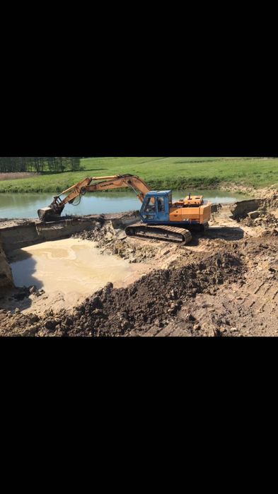 Kopanie stawów odmulanie usługi koparką