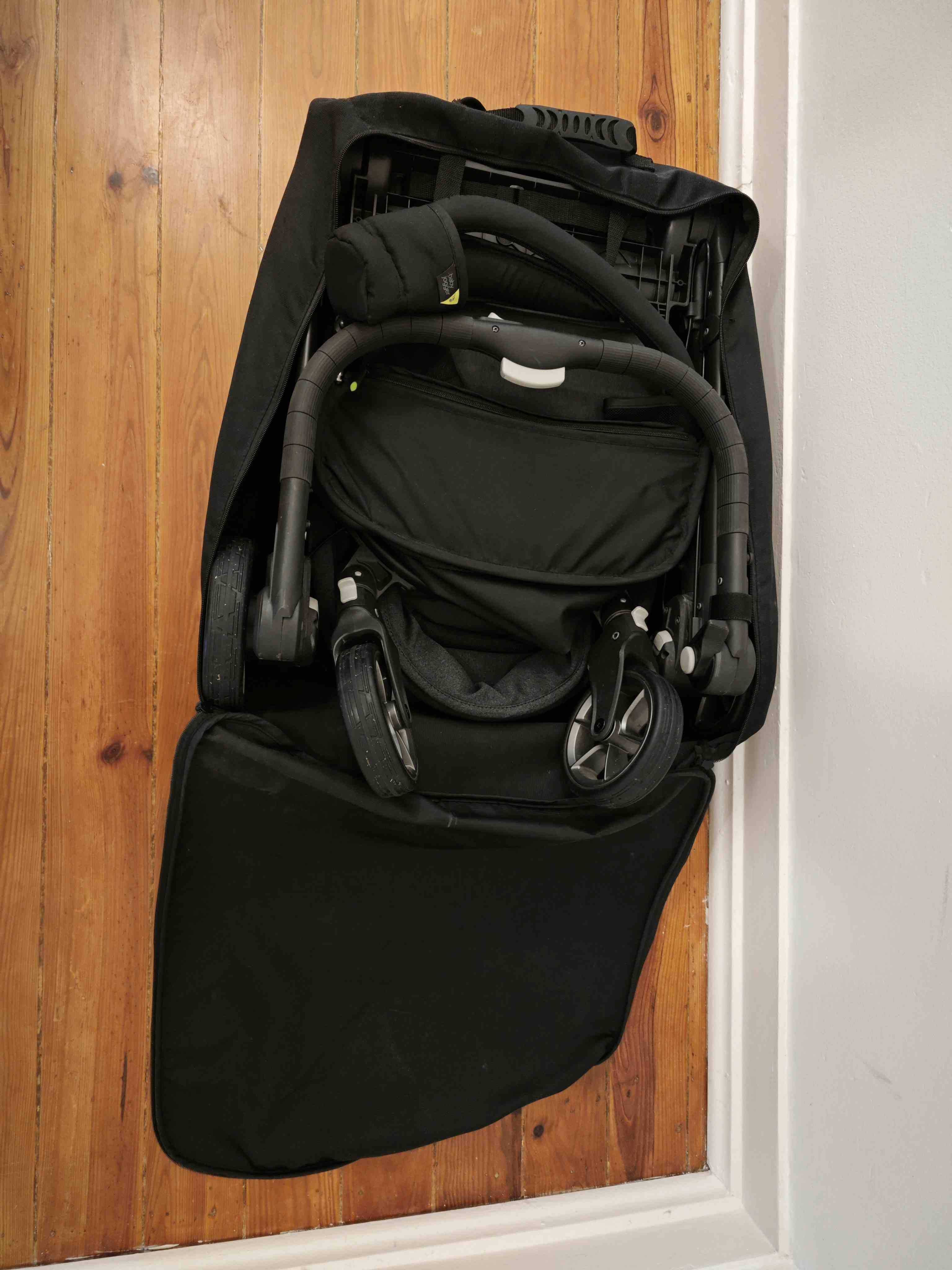 Baby Jogger City Lux e adaptadores Ovo Cybex + protector chuva