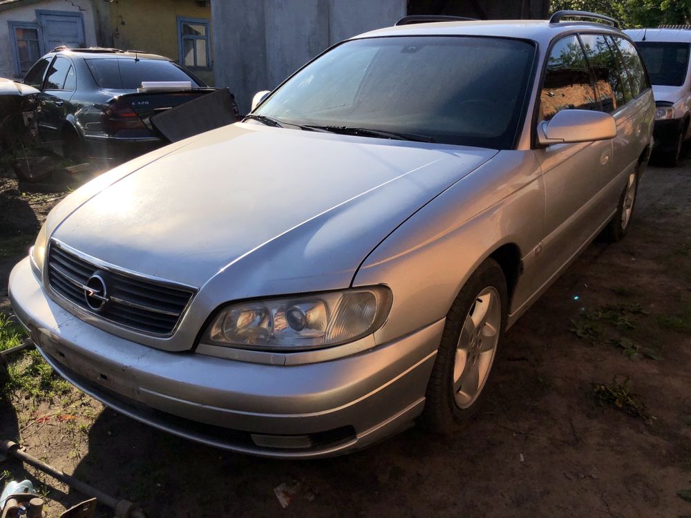 Разборка Opel Omega B бампер капот дверь фары двигатель салон ляда гбц