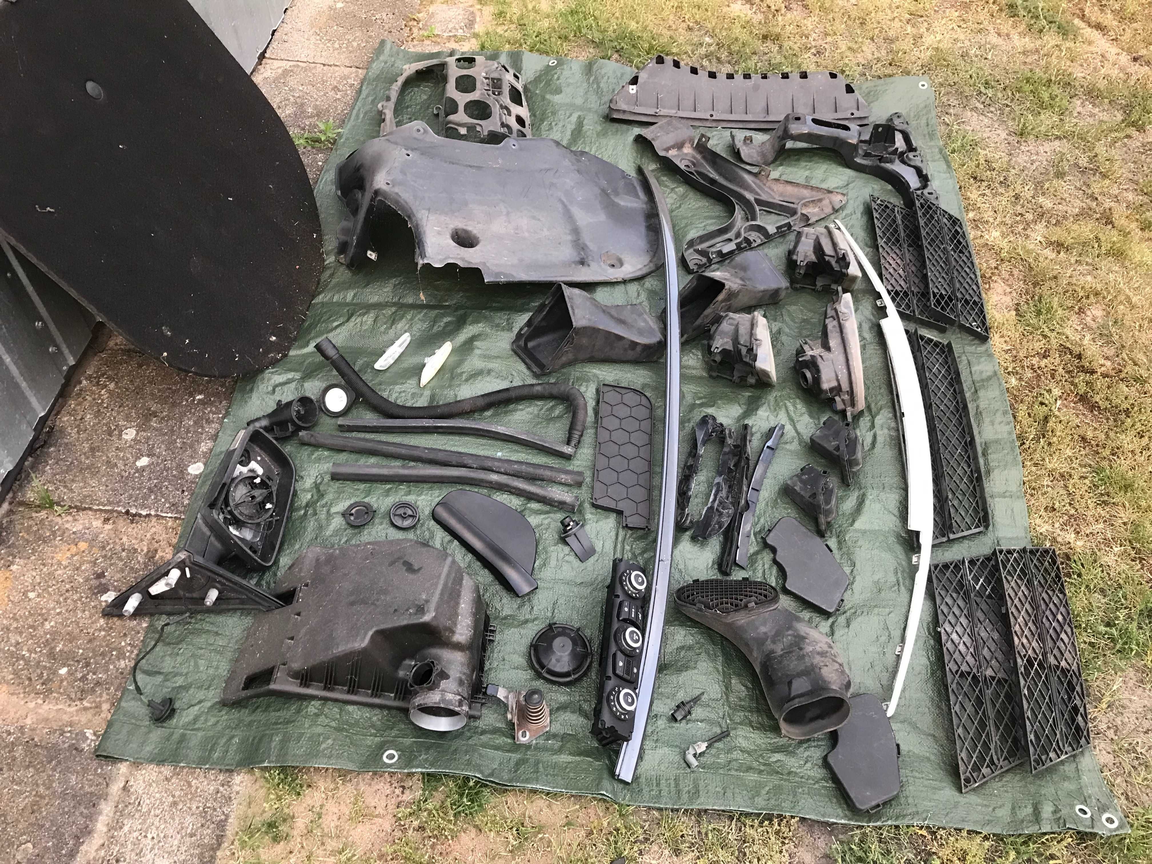 Części BMW e60 czujniki zaślepki listwy halogeny kratki
