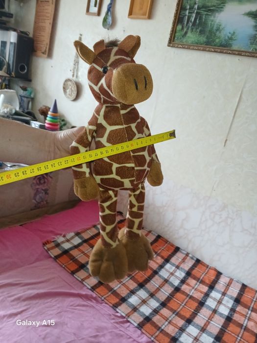 Продам жирафа игрушку