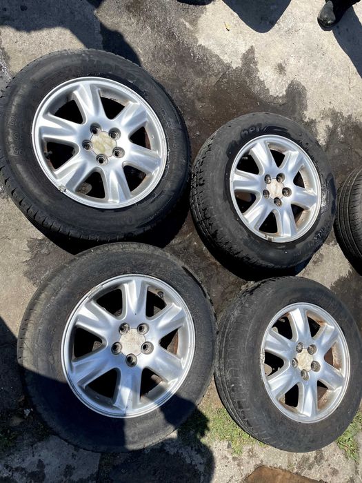 Subaru Impreza III 5x100 Komplet felg alufelgi 195/65 R15
