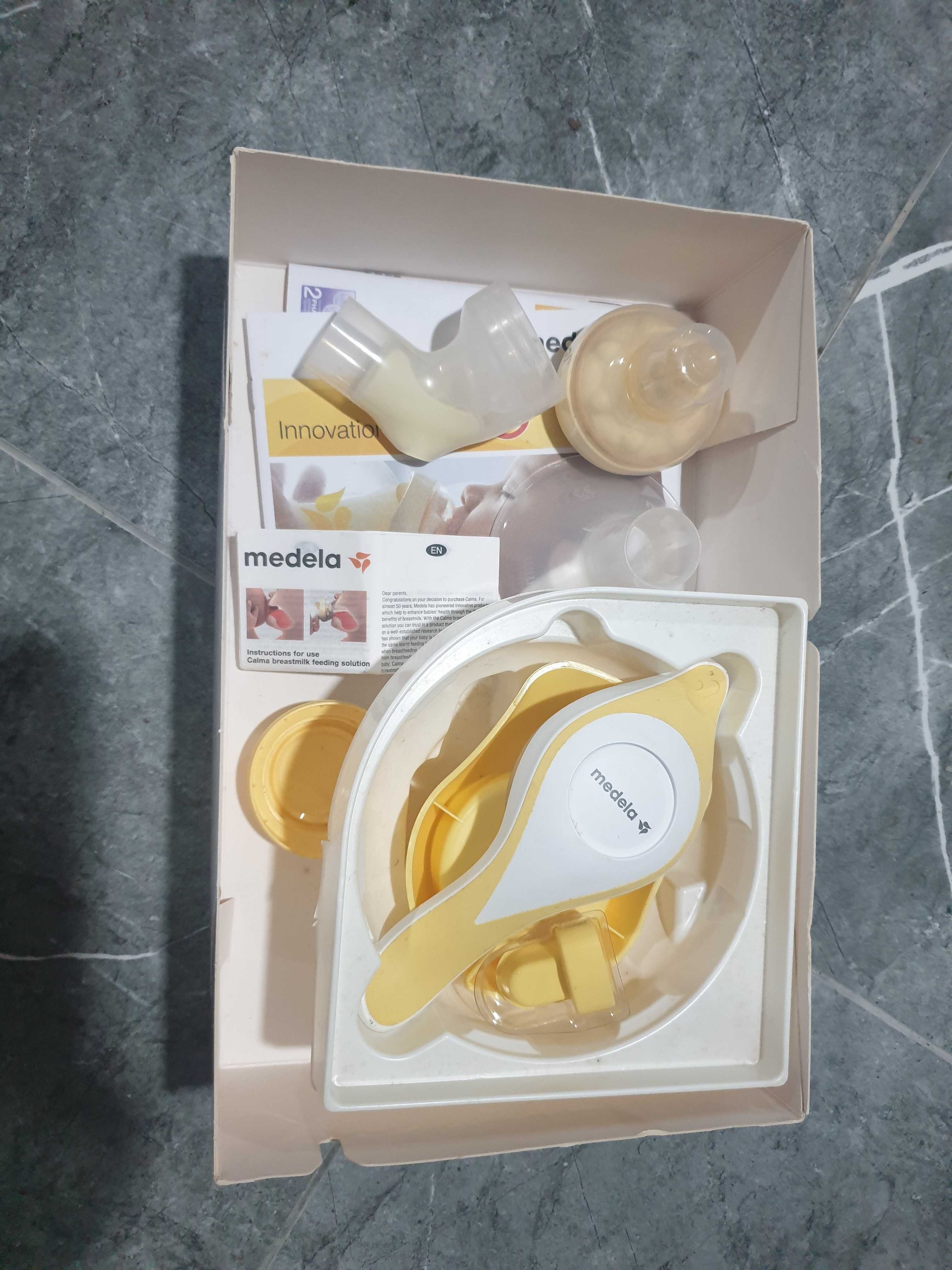 Bomba manual tira leite Medela com oferta