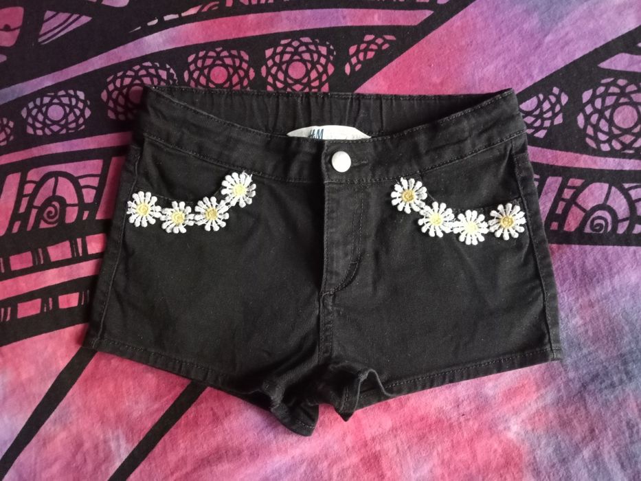 H&M szorty spodenki jeansowe z kwiatuszkami 134 cm