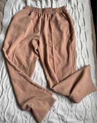Модні жіночі штани на резинці тканнині бежеві L XL