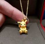 Złoty wisiorek Pokemon Pikachu