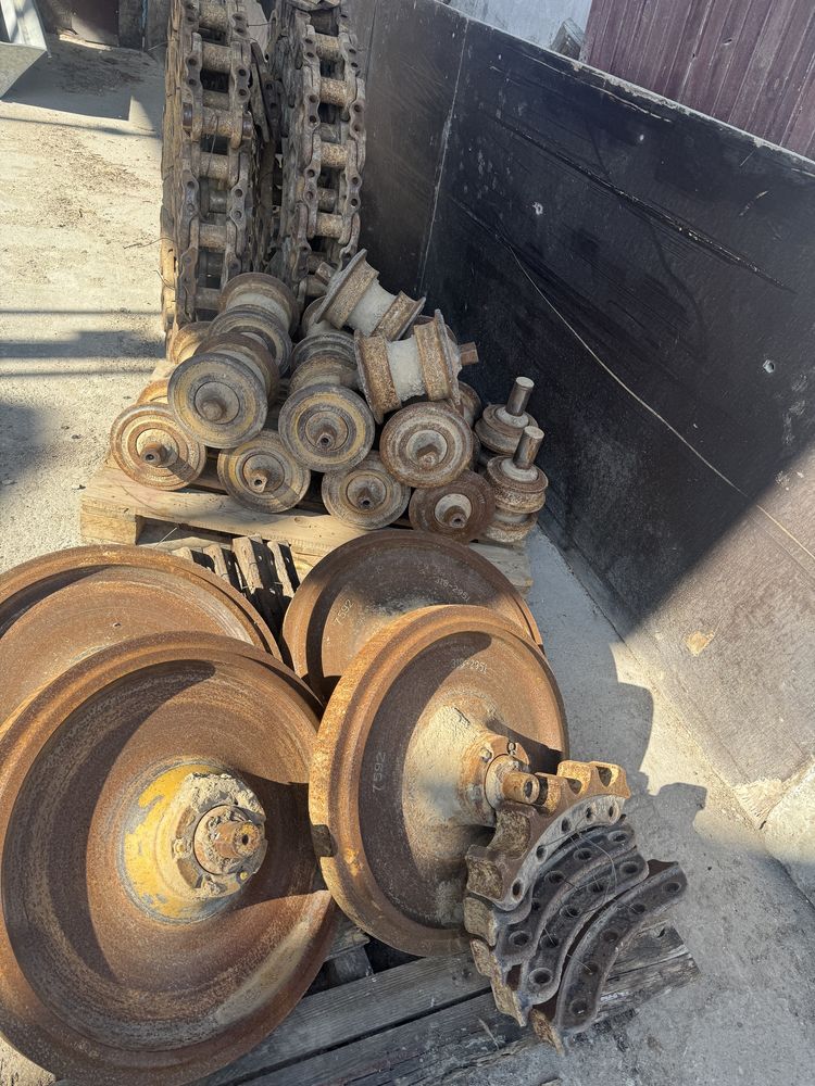 Podwozie łancuchy rolki kola CAT D6 system one