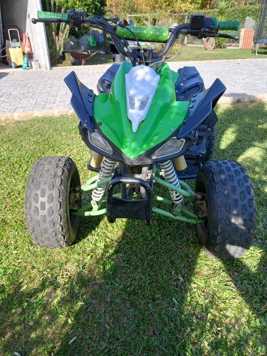 Moto 4 criança a gasolina