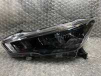 LAMPA LEWA ZWYKŁA CZARNA NISSAN MICRA K14 26060 5FA08 KOITO 100-18728