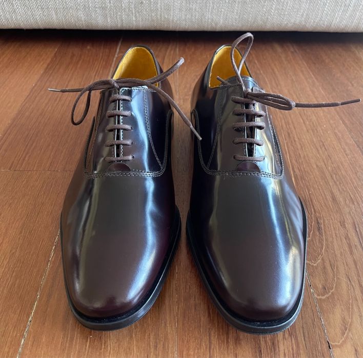 Sapatos elegantes de homem