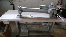 Maquina custura braço longo.