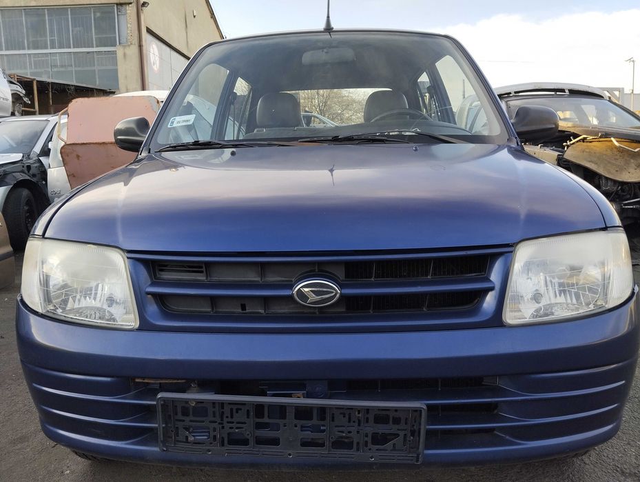 Daihatsu Cuore 1.0i 5D 1999r.Zderzak przedni.